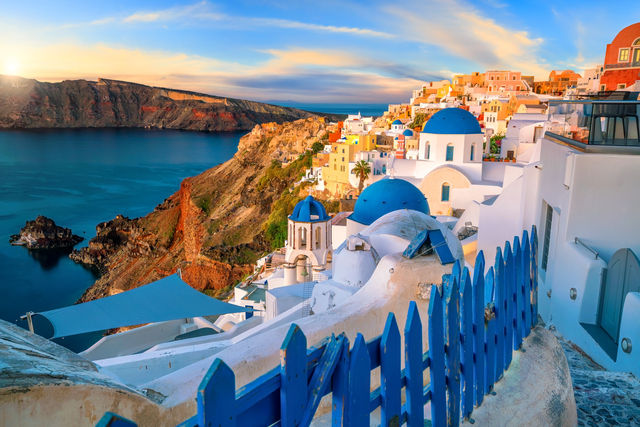 Great twilight view of Santorini island. Sunset on the famous Oia city, Greece, Europe